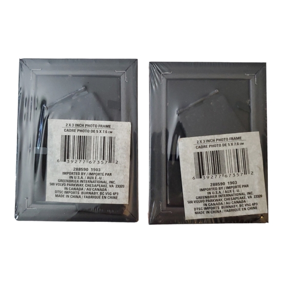 Two small 2" X 3" copper colored photo frames - Picture 2 of 2